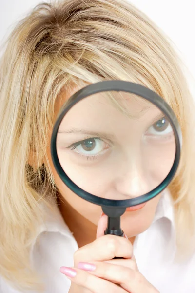 stock image Girl with a magnifying glass