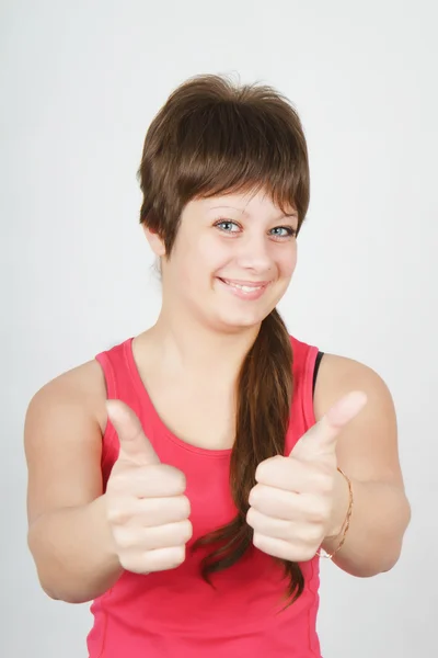 Happy girl with thumbs up — Stock Photo, Image