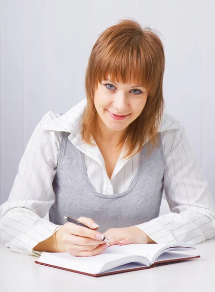 Girl with a notebook — Stock Photo, Image