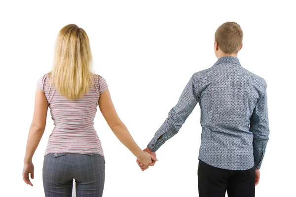 A young couple holding hands, back to camera — Stock Photo, Image
