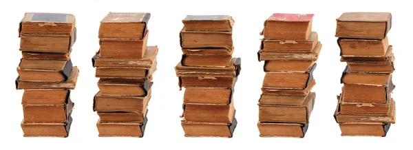 Cinco libros antiguos apilados de diferente forma y color — Foto de Stock