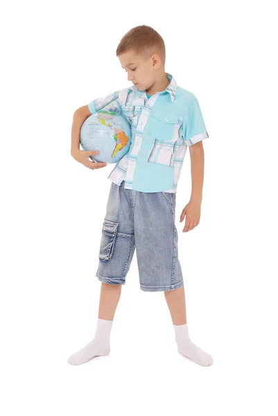 The boy holds the globe in hands — Stock Photo, Image