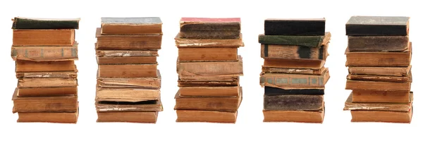 Cinco libros antiguos apilados de diferente forma y color — Foto de Stock