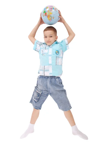 The boy the boy jumps with the globe — Stock Photo, Image