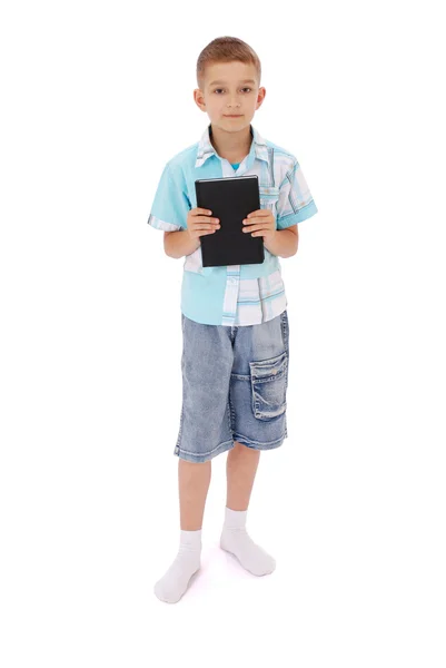 The boy holds the black book — Stock Photo, Image