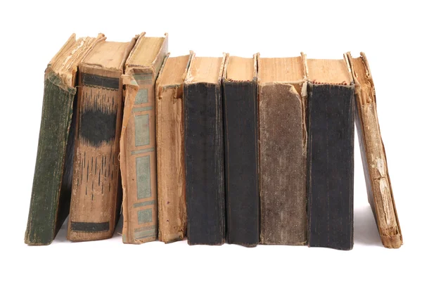Row of old books on white background — Stock Photo, Image