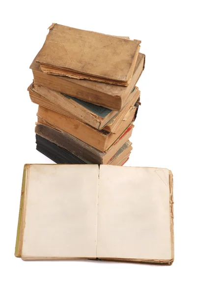 Különböző alakú és színű halmozott régi könyvek — Stock Fotó