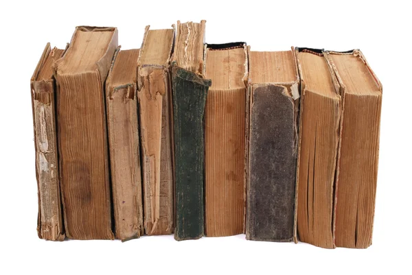 Gestapelde oude boeken van verschillende vorm en kleur — Stockfoto