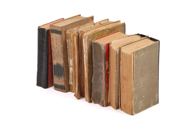 Apilados viejos libros de diferente forma y color —  Fotos de Stock