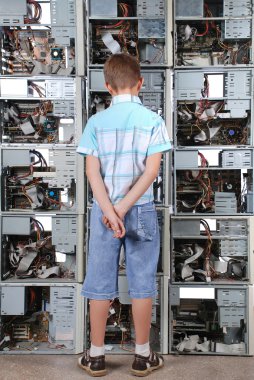 Boy faces to a wall from old computer case clipart
