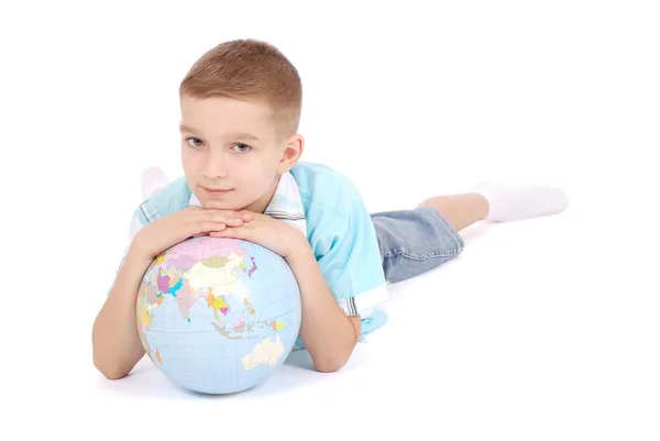 The boy holds the globe in hands — Stock Photo, Image