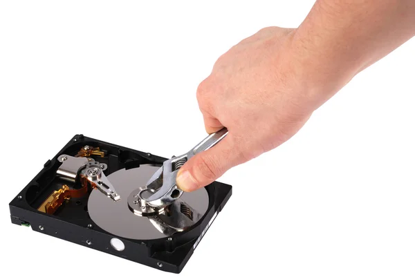 Hand with a open hard disk drive. — Stock Photo, Image