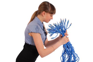 Girl before itself holds the big sheaf of network wires RJ45 clipart