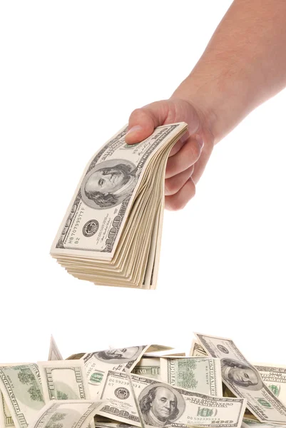 Ręka trzyma paczkę kilkaset dolarów banknotów — Zdjęcie stockowe