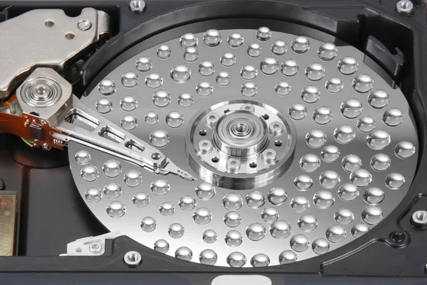 Drops of water on HDD — Stock Photo, Image