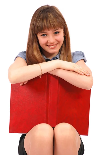 Mädchen hält das offene Buch — Stockfoto