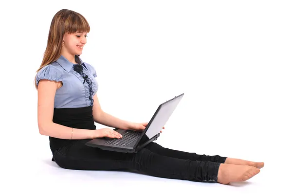 stock image The girl holds laptop