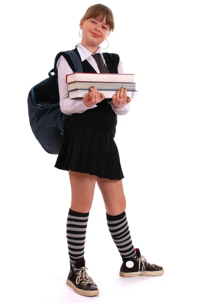 Menina segura os livros — Fotografia de Stock