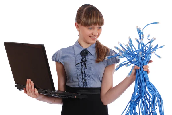 Meisje in de ene hand houdt de grote schoof van netwerk draden rj45 — Stockfoto