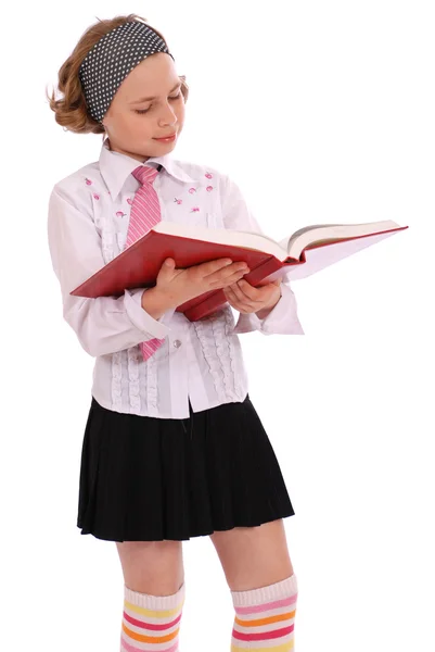Meisje houdt open rode Boek — Stockfoto