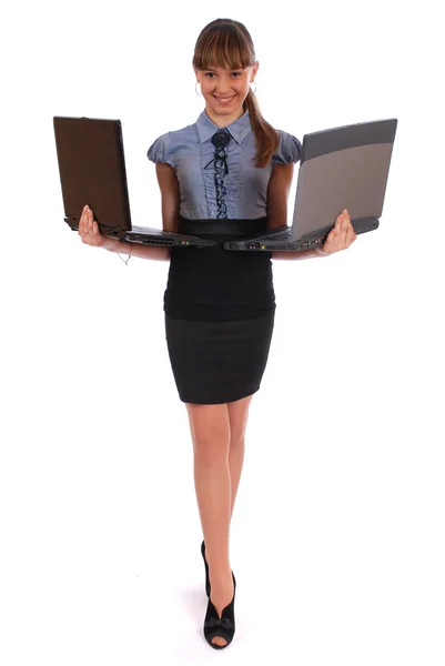 Dziewczyna trzyma dwa laptop — Zdjęcie stockowe