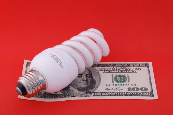 Lámpara Luminiscente Cien Dólares Sobre Fondo Rojo — Foto de Stock