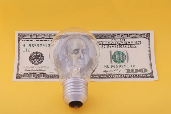 Lampe électrique sur cent dollars — Photo