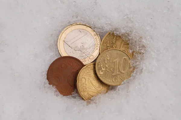 stock image Lost coins on a snow