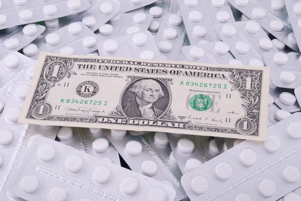 Één Dollar Legt Een Achtergrond Van Tabletten — Stockfoto