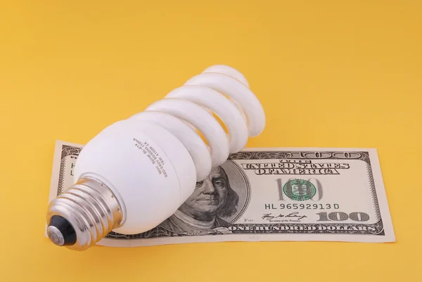 Lámpara Luminiscente Cien Dólares Sobre Fondo Amarillo — Foto de Stock