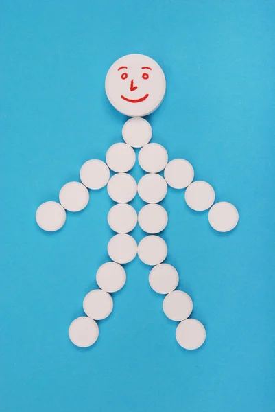Malý Muž Kombinaci Bílé Tablety Modrém Pozadí — Stock fotografie
