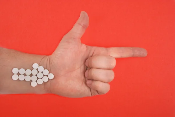 Arrow Combined White Tablets Arrow Lays Hand Red Background — Stock Photo, Image