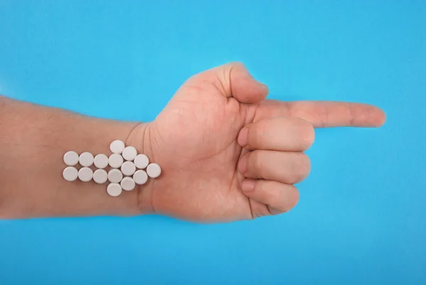 Pilen kombineras från vita tabletter. — Stockfoto