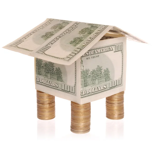 A ház az érmék dollárt költségek. — Stock Fotó