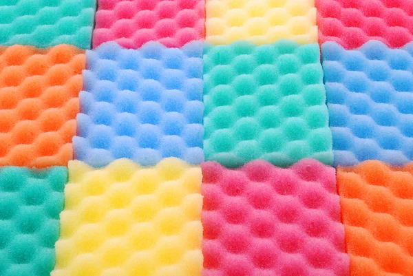 Esponjas coloridas fundo — Fotografia de Stock
