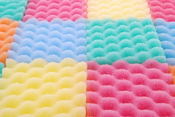 Esponjas coloridas fundo — Fotografia de Stock
