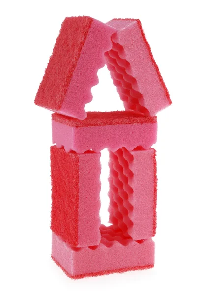 Casa feita de esponjas vermelhas — Fotografia de Stock