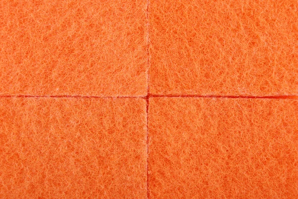 オレンジ色のテクスチャ セルロース発泡スポンジ — ストック写真