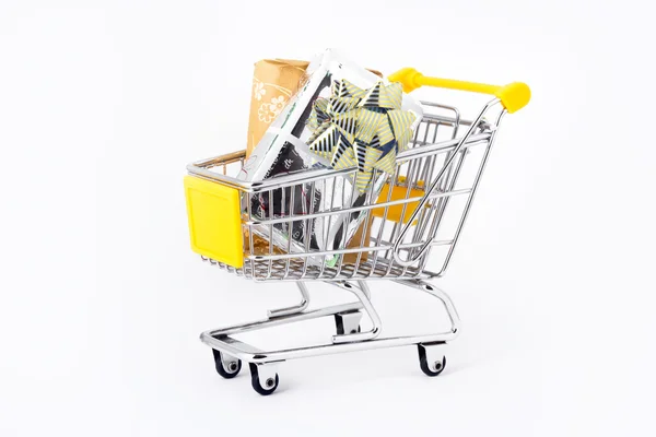 Gifts in a shopping-cart — Stock Photo, Image