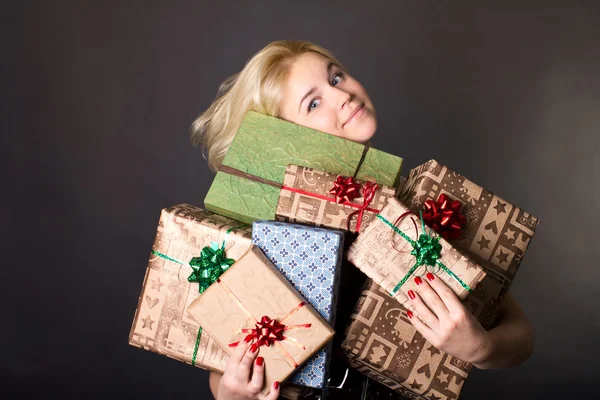 Lovely Woman Holding Many Gift Boxes Black Background — Stock Photo, Image