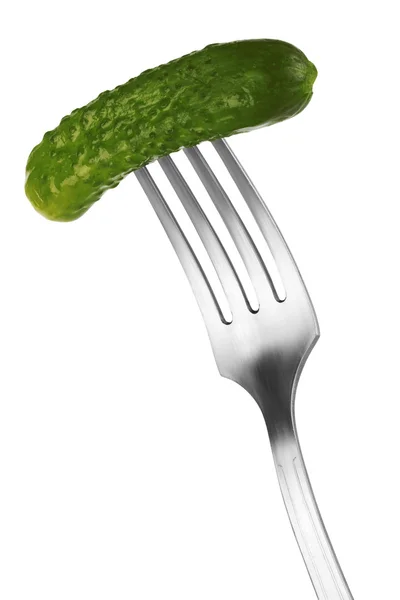 Pickled cucumber on a fork — Stock Photo, Image