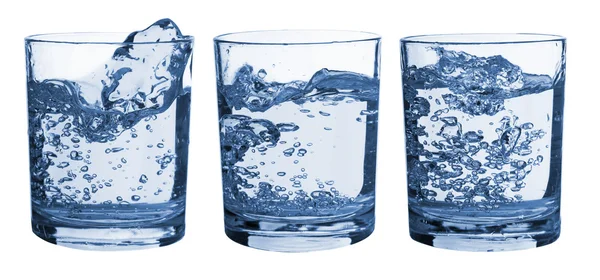 Set of glasses water splash — Stock Photo, Image