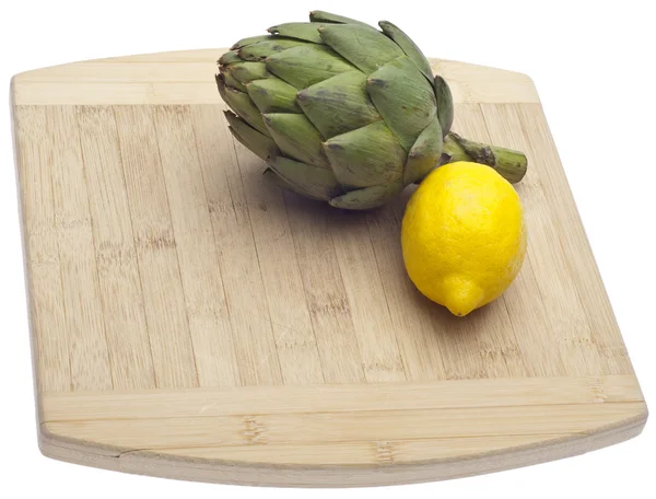 Sfondo cucina con limone fresco e carciofo — Foto Stock