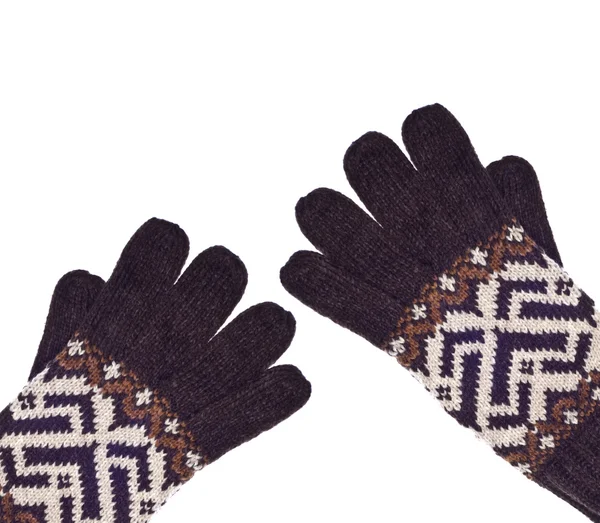 Бордюр из коричневых зимних перчаток — стоковое фото