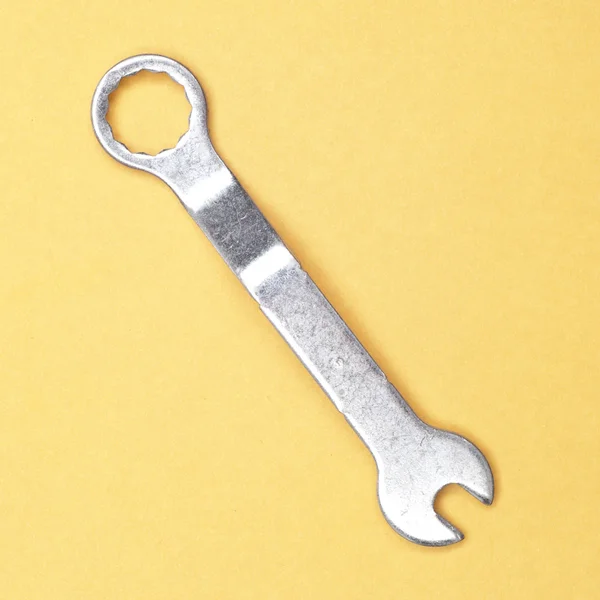 Small Wrench on Yellow. — Stock Photo, Image