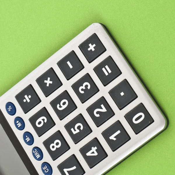 Primer plano de una calculadora sobre un fondo vibrante —  Fotos de Stock