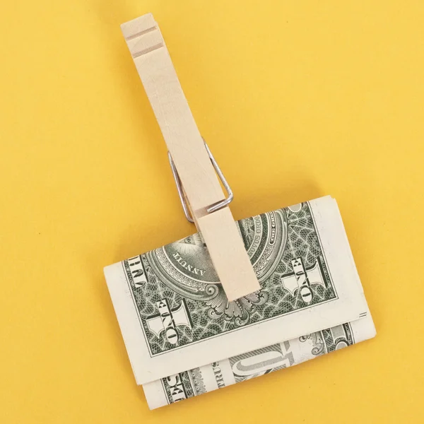 Amerykańskiej waluty w clothespin — Zdjęcie stockowe