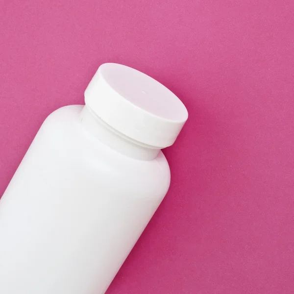 Bílá lahev vitamínů — Stock fotografie