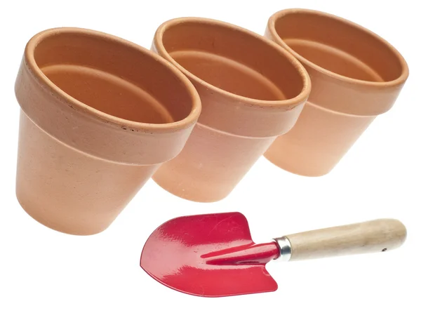Trio de vasos de barro com pá vermelha — Fotografia de Stock