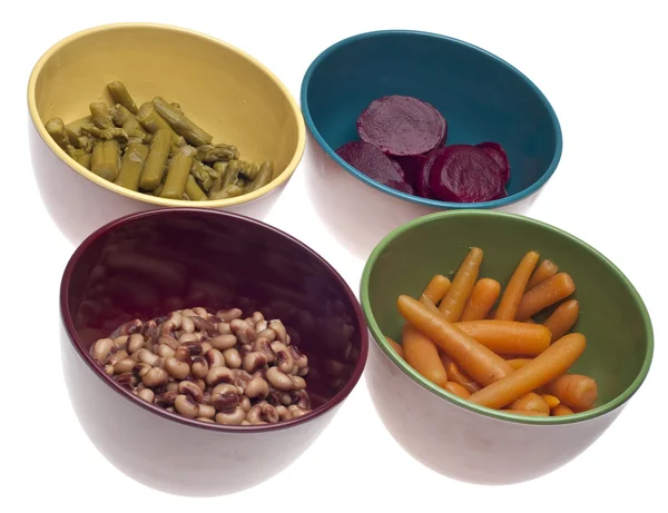 Mängd konserverade grönsaker i skålar — Stockfoto